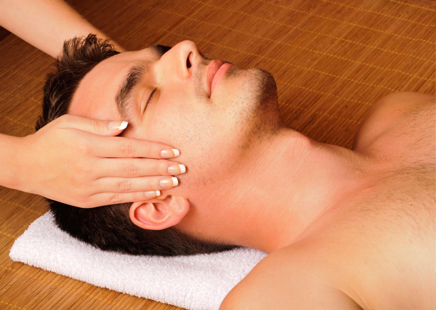 Man-getting-a-face-massage - Zen Spa